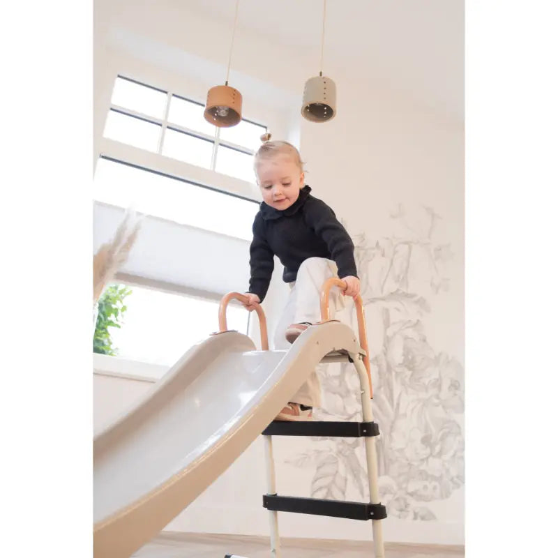 lifestyle-shot-of-girl-sliding-on-exit-my-first-indoor-kids-slide