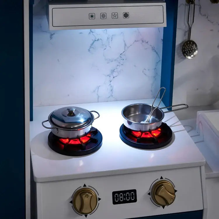 glowing-play-cooker-rings-with-metal-pots-at-night