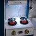 glowing-play-cooker-rings-with-metal-pots-at-night
