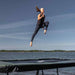 gymnast-jumps-acon-16HD-trampoline