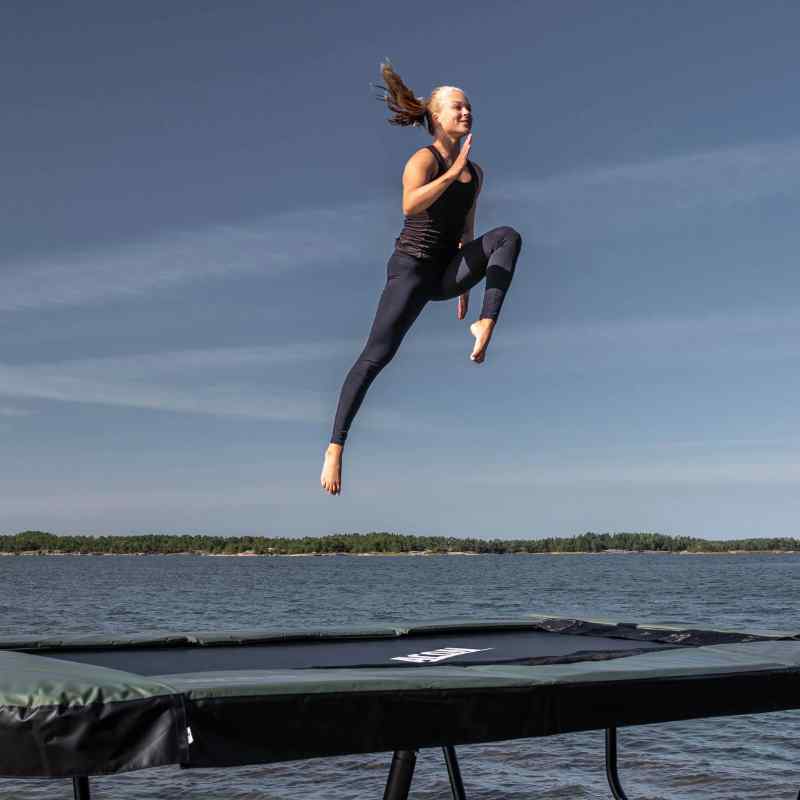 gymnast-jumps-acon-16HD-trampoline