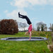 gymnastics-handstand-on-exit-interra-ground-level-trampoline-12ft-lifestyle-view
