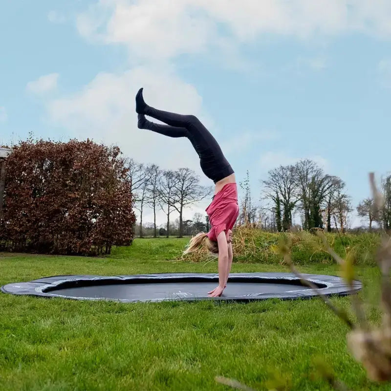 gymnastics-handstand-on-exit-interra-ground-level-trampoline-12ft-lifestyle-view