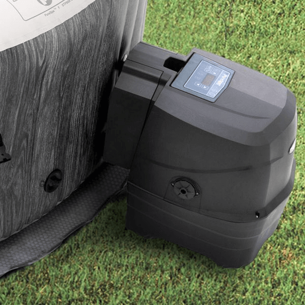 intex-spa-greywood-deluxe-equipment-pack-installed-and-sitting-on-grass