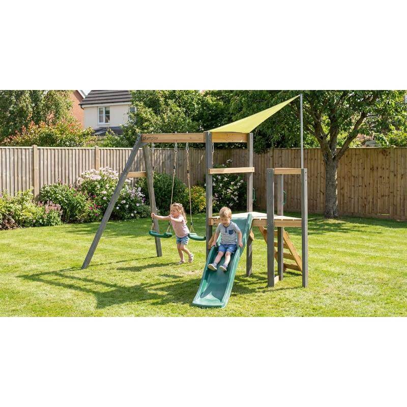 kids-climbing-the-wooden-ladder-to-the-raised-platform-of-a-plum-play-set