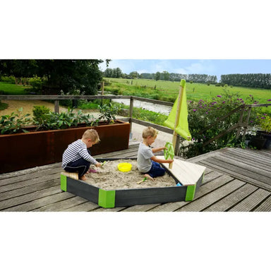 kids-enjoying-the-sand-on-exit-aksent-boat-sandpit-lifestyle-shot