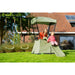 outdoor-shot-of-kids-enjoying-the-slide-on-exit-ivy-playset-with-swing-set-and-slide