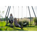 kids-enjoying-the-swing-on-exit-ivy-outdoor-swing-set-with-bush-in-the-background