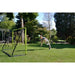 Lifestyle shot of a kid hitting football ball towards EXIT Tempo football goal.