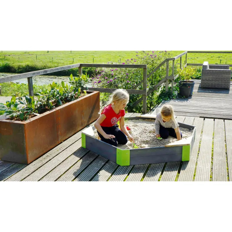 kids-playing-on-sand-on-exit-aksent-wooden-hexagon-sandpit