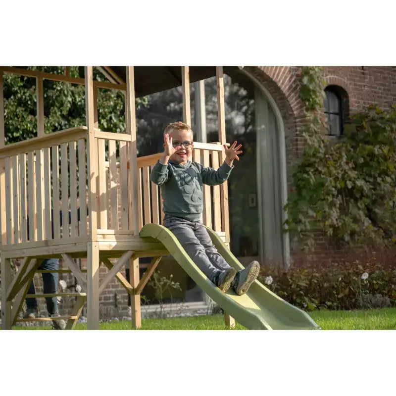 kids-sliding-on-exit-panorama-300-playhouse-with-slide