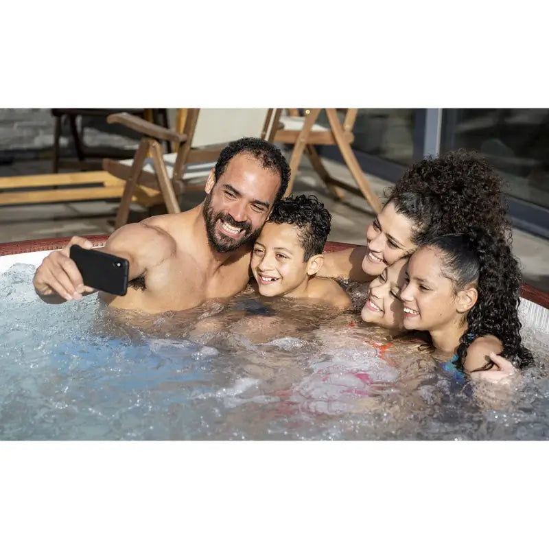 lay-z-spa-helsinki-airjet-with-family-taking-a-picture