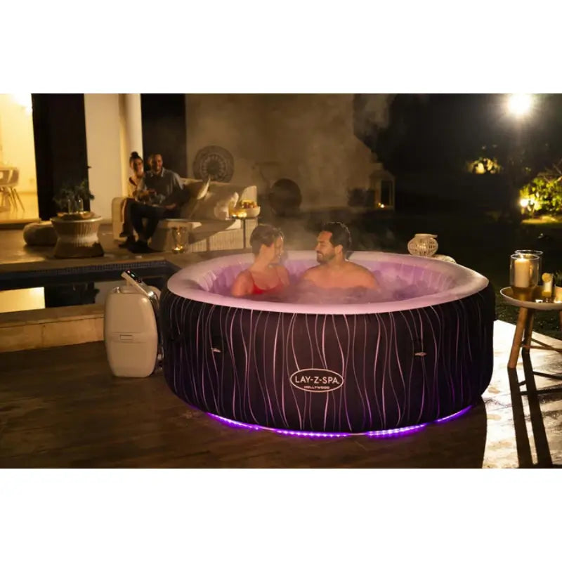 lay-z-spa-hollywood-airjet-with-colour-changing-lights-with-two-people-soaking-and-enjoying-together