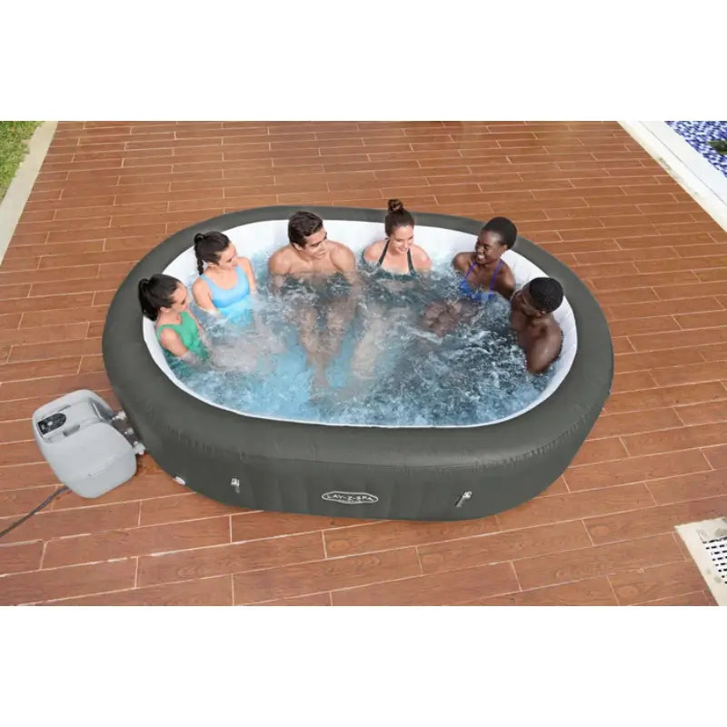 lay-z-spa-mauritius-7-person-airjet-hot-tub-with-grey-exterior-walls-and-wide-rim-with-people-soaking