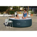 couple-soaking-in-lay-z-spa-new-york-airjet-insulated-hot-tub-and-energy-efficient