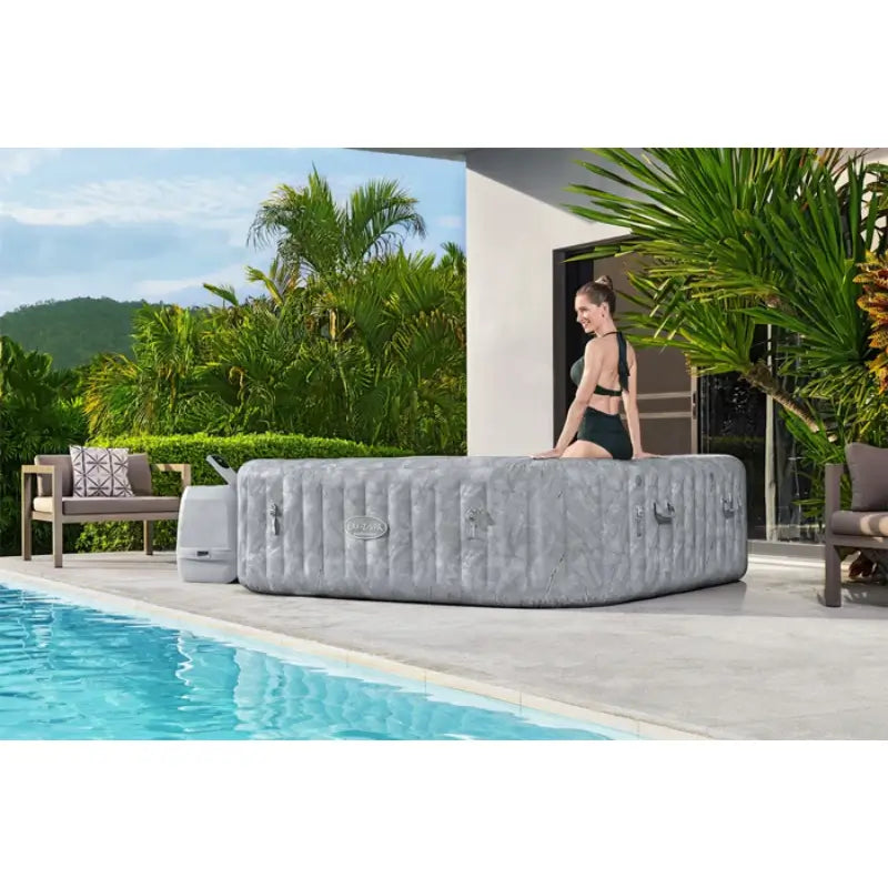 poolside-set-up-of-lay-z-spa-san-francisco-hot-tub-with-grey-exterior-finish