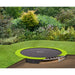 level-ground-trampoline-with-green-border-installed-flush-against-green-grass