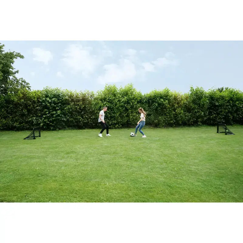 lifestyle-shot-of-black-exit-pico-football-goal-with-teens-playing