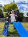 little-girl-at-the-top-of-blue-slide-on-activity-centre