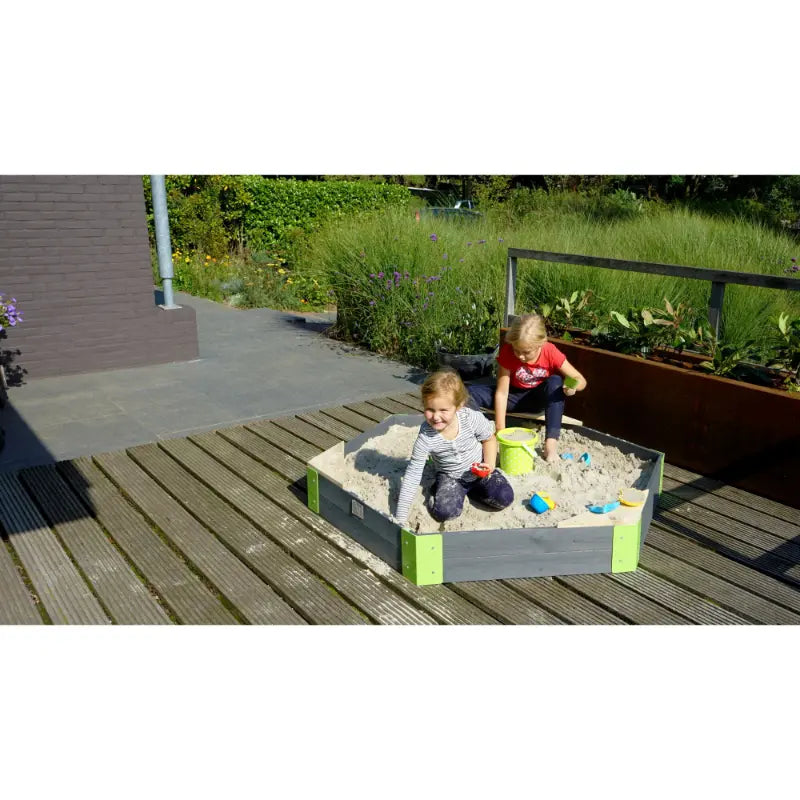 lovely-kids-enjoying-the-exit-wooden-sandpit-hexagon-shape