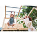 low-angle-view-of-children-swinging-on-monkey-bars-of-plum-wooden-activity-center