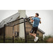 man-using-the-berg-pull-up-bar-attached-to-playbase