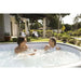 teens-soaking-in-mauritius-airjet-lazy-spa-with-water-bubbles