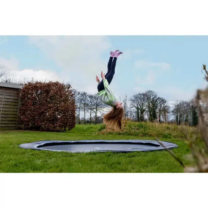 mid-air-jump-shot-with-exit-interra-ground-level-trampoline-305cm