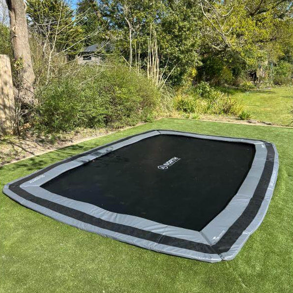 north-17ft-x-12ft-rectangular-inground-trampoline-installed-in-garden