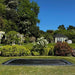 north-17ft-x-12ft-rectangular-inground-trampoline-installed-in-landscaped-garden