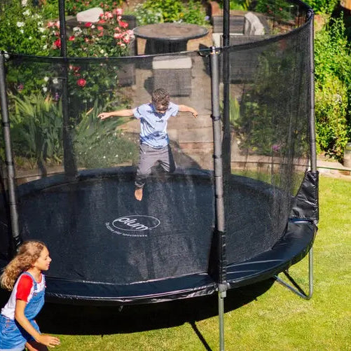 overhead-view-of-boy-jumping-on-plum-spacezone-trampoline