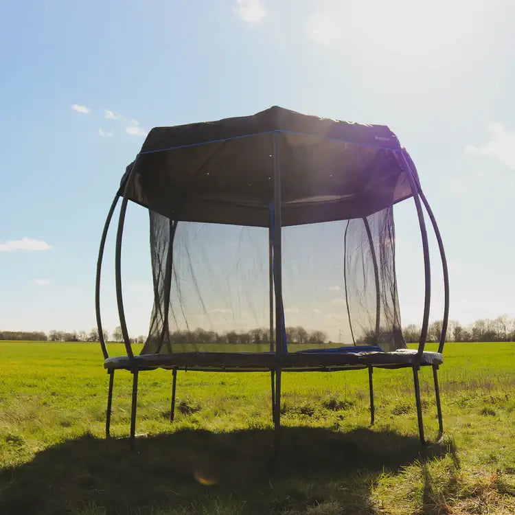 round-garden-trampoline-with-roof-cover-and-safety-net-in-field