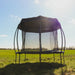 round-garden-trampoline-with-roof-cover-and-safety-net-in-field