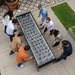 overhead-shot-of-rs-barcelona-max-football-table-with-eight-players-gathered-around