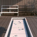 side-view-of-rs-barcelona-outdoor-shuffleboard-showing-pucks-on-the-playing-field