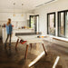 rs-barcelona-white-ping-pong-table-set-up-in-the-kitchen-area