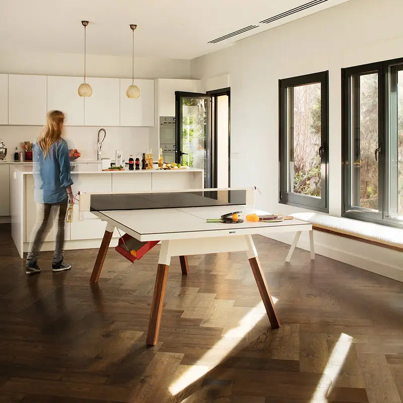 rs-barcelona-white-ping-pong-table-set-up-in-the-kitchen-area