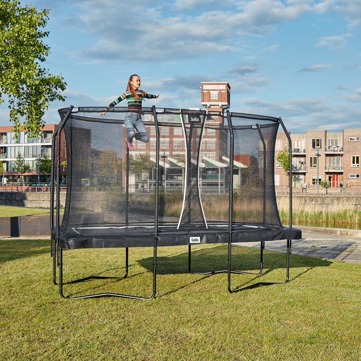 salta-premium-black-edition-rectangular-trampoline-with-child-jumping-outdoors
