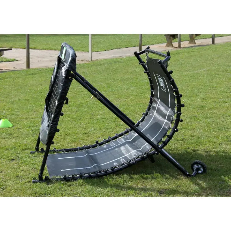 side-view-of-exit-kickback-rebounder-playground-setup