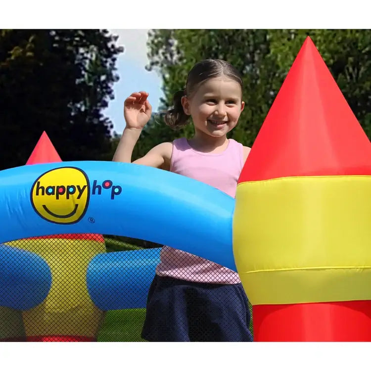 smiling-girl-bouncing-inside-colourful-castle-bouncer