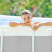 girl-leaning-on-rim-with-support-beams-detail-of-intex-pool-4-x-2-x-1-22