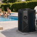 thermotec-apex-inverter-swimming-pool-heat-pump-installed-beside-a-garden-pool-with-family-swimming-in-the-background