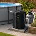 thermotec-apex-pool-heat-pump-connected-to-an-above-ground-garden-swimming-pool-with-sand-filter-and-pipework-image-lifestyle