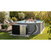 thermotec-edge-pool-heat-pump-connected-to-octagonal-above-ground-pool-with-family_ac8e240a-46a4-4cc3-8fe8-562c0f2125be