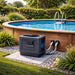 thermotec-pro-pool-heat-pump-installed-beside-round-above-ground-pool-in-landscaped-garden