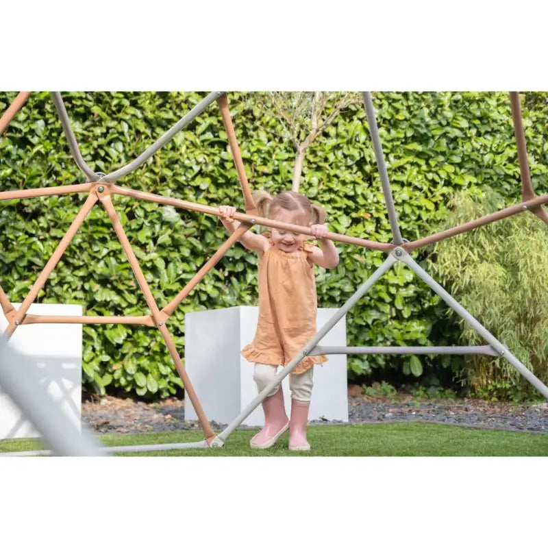 garden-play-lifestyle-view-toddler-about-to-climb-on-exit-backyard-climbing-dome