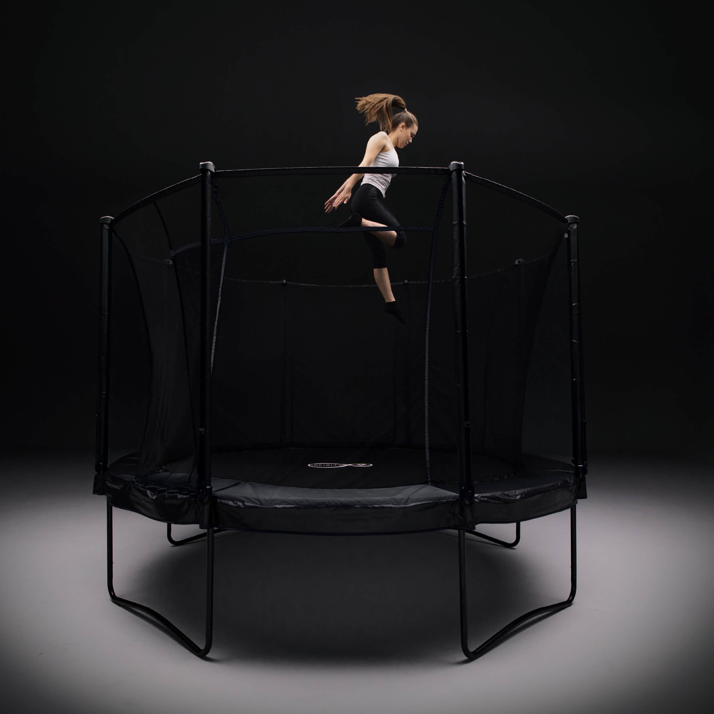 tp-12ft-infinity-round-trampoline-in-use-for-garden-play