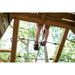underneath-view-of-child-standing-on-rope-climbing-bridge-beneath-wooden-playcentre