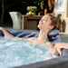 woman-relaxing-in-lay-z-spa-carrara-with-padded-pillow