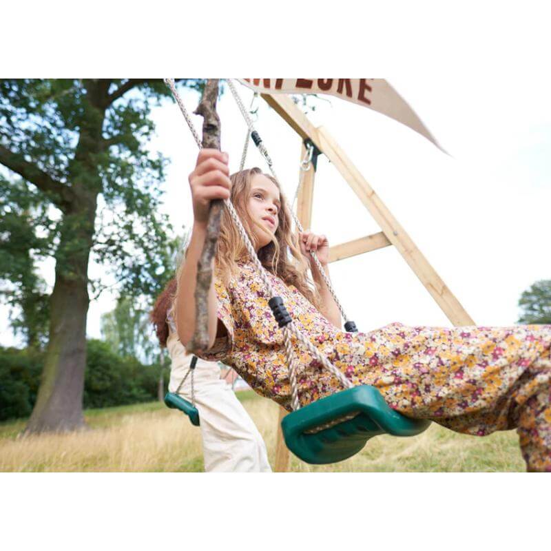 young-girl-playing-on-green-plastic-swing-attached-to-plum-wooden-climbing-frame_26c6149e-c78e-4455-b67b-735ff9d8031f